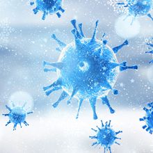 illustration of blue coronavirus particles with snowflakes in the background