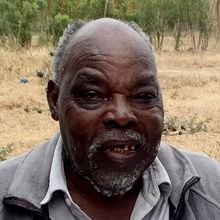 Elderly African man smiling